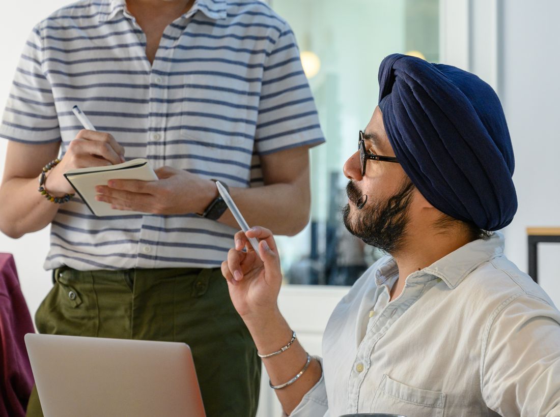 Exporters collaborating happily at their desks